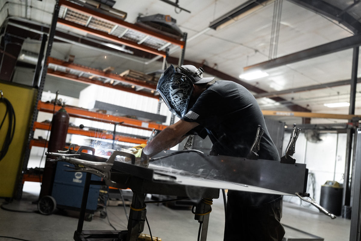 Welding sparks in the Zanotti Armor shop